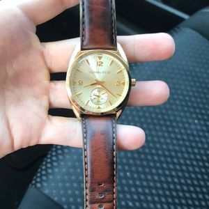 MK gold and brown leather watch